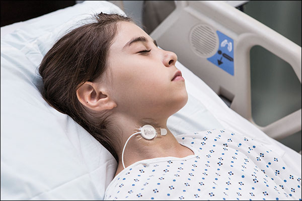 Acoustic Respiration Rate (RRa®) around girl's neck
