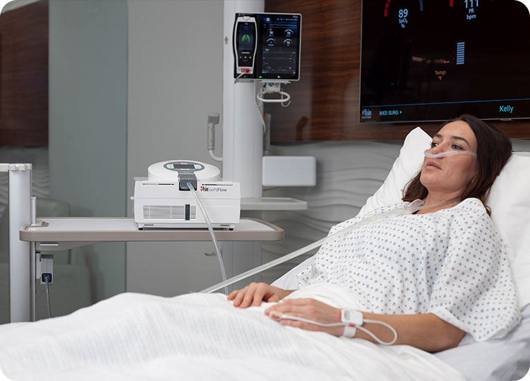 Masimo - softFlow nasal application on woman laying in hospital bed